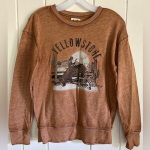 - Maurice’s Yellowstone graphic crewneck tee- Rust orange
